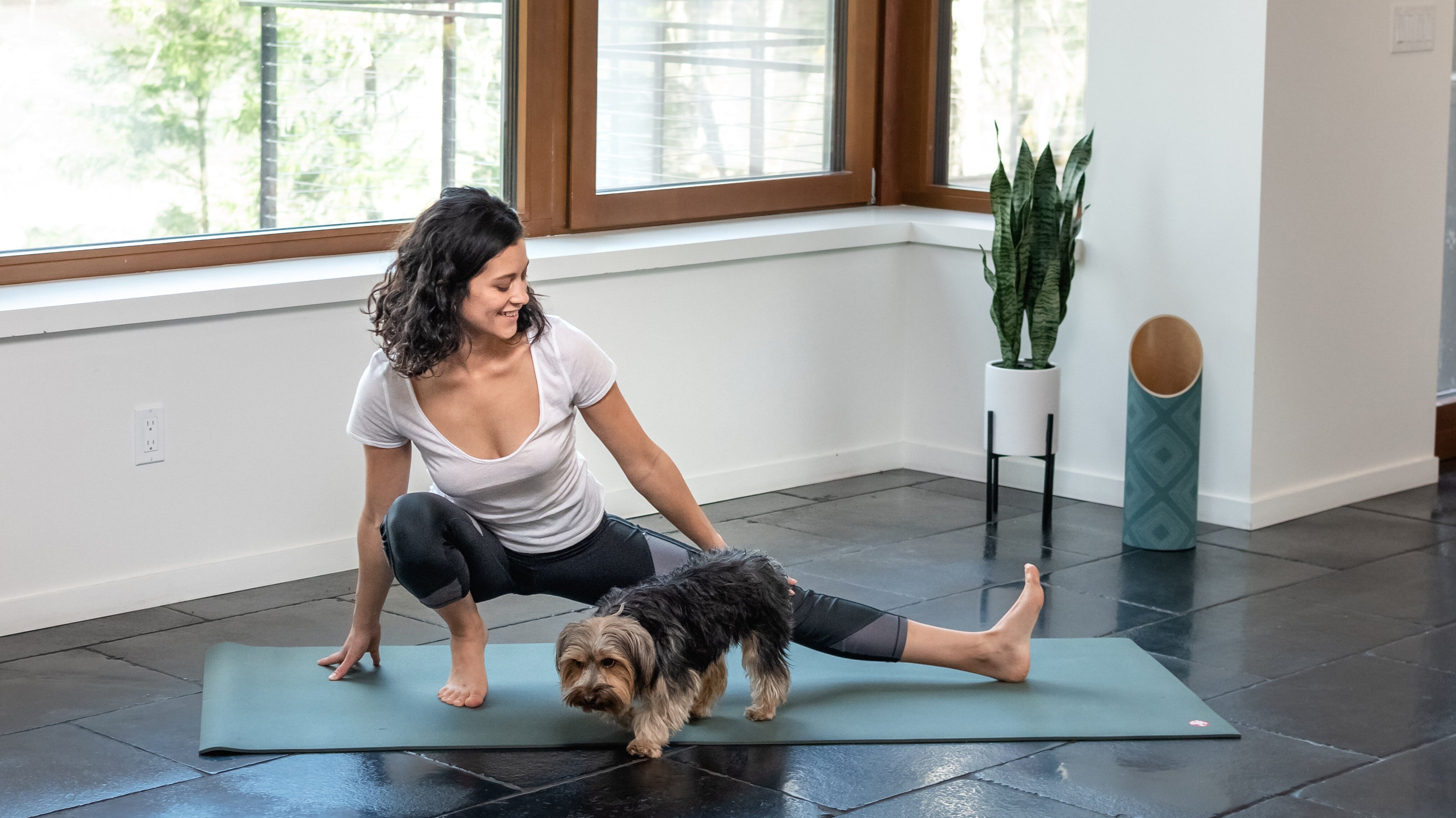 Woman practicing yoga at Cow Horn winery