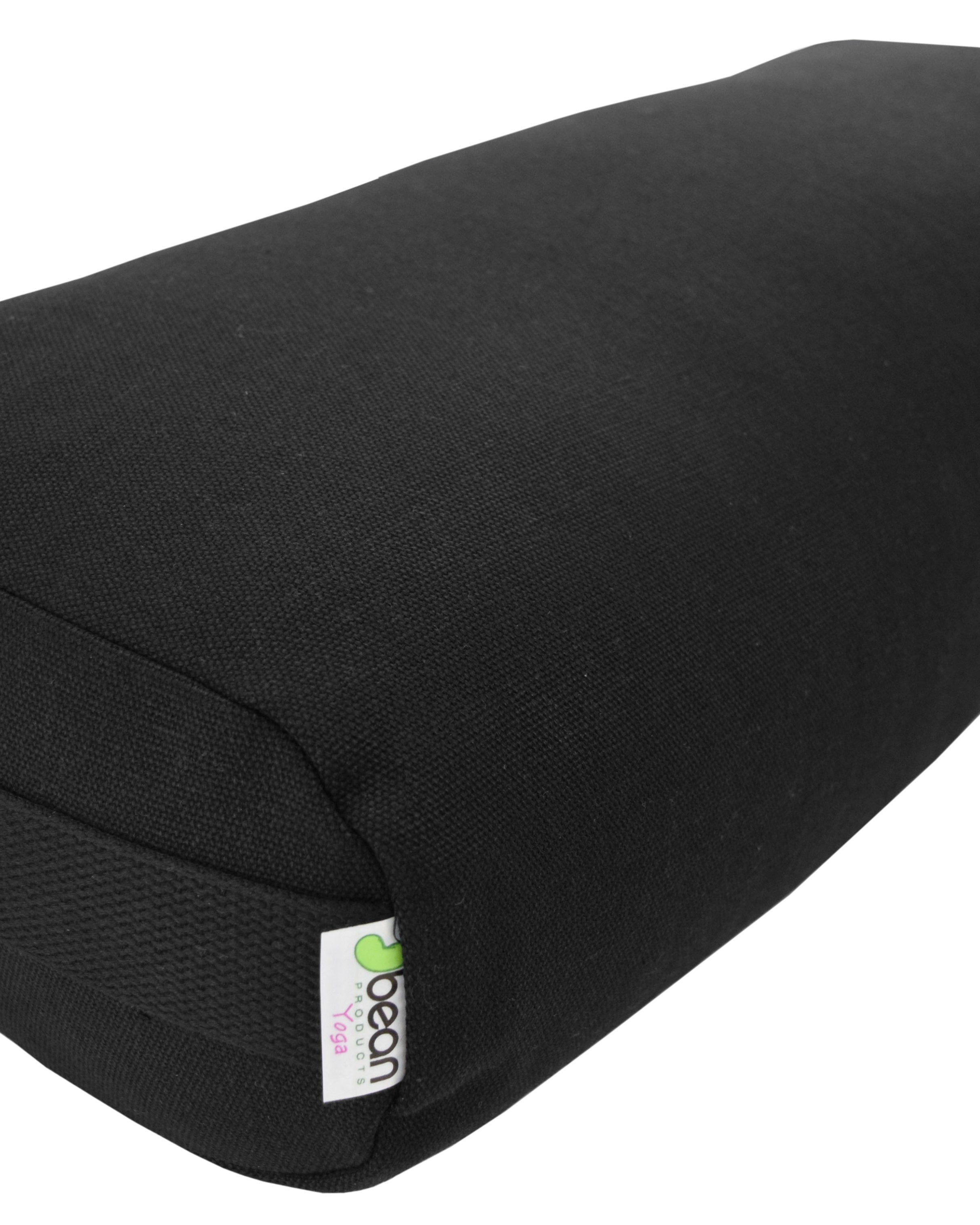 Black yoga bolster with a brand label on a white background