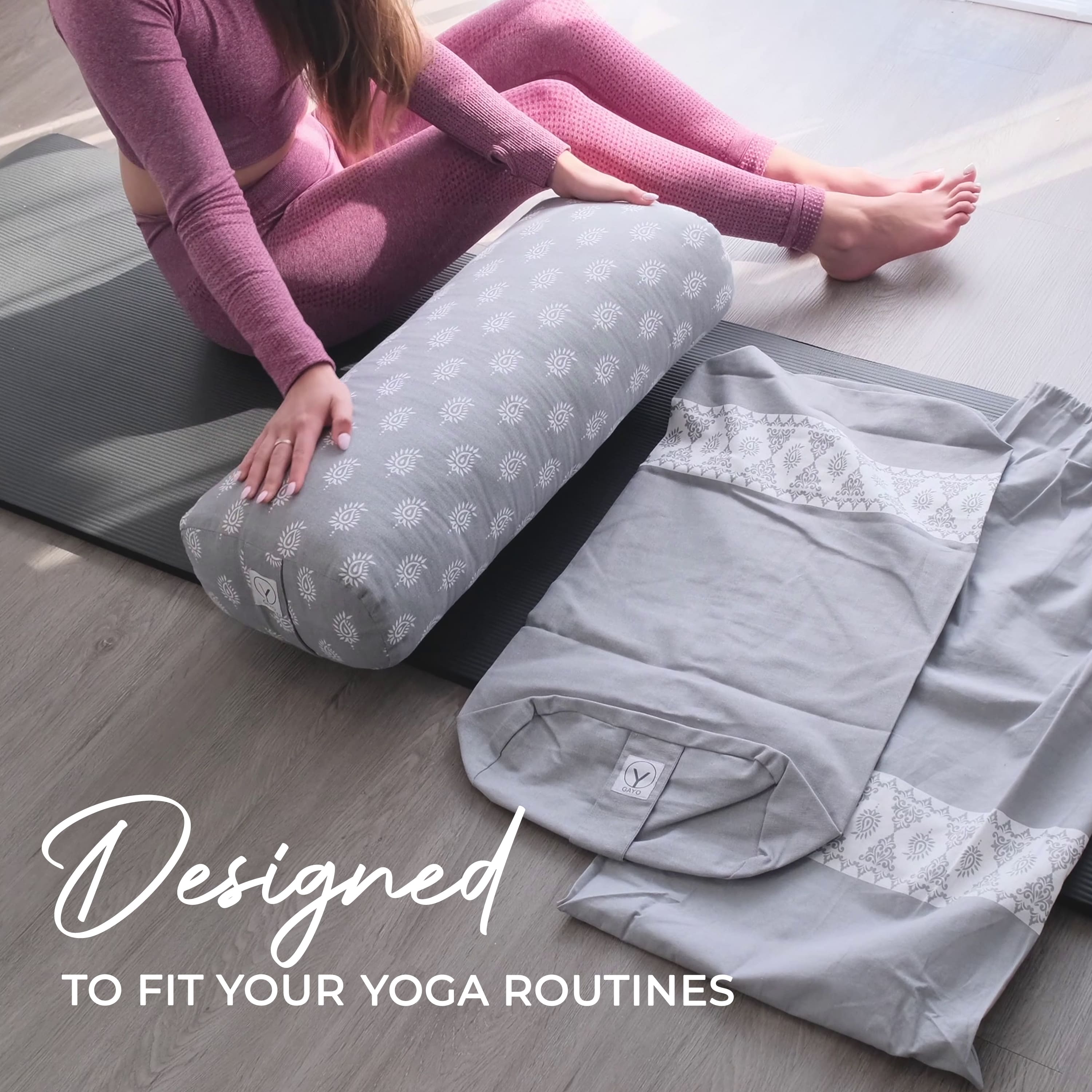 Person using a yoga bolster on a mat with text 'Designed to fit your yoga routines'.