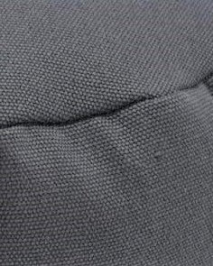 Close-up of a textured gray fabric surface