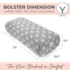 Gray bolster pillow with white patterns and dimensions on a pink background