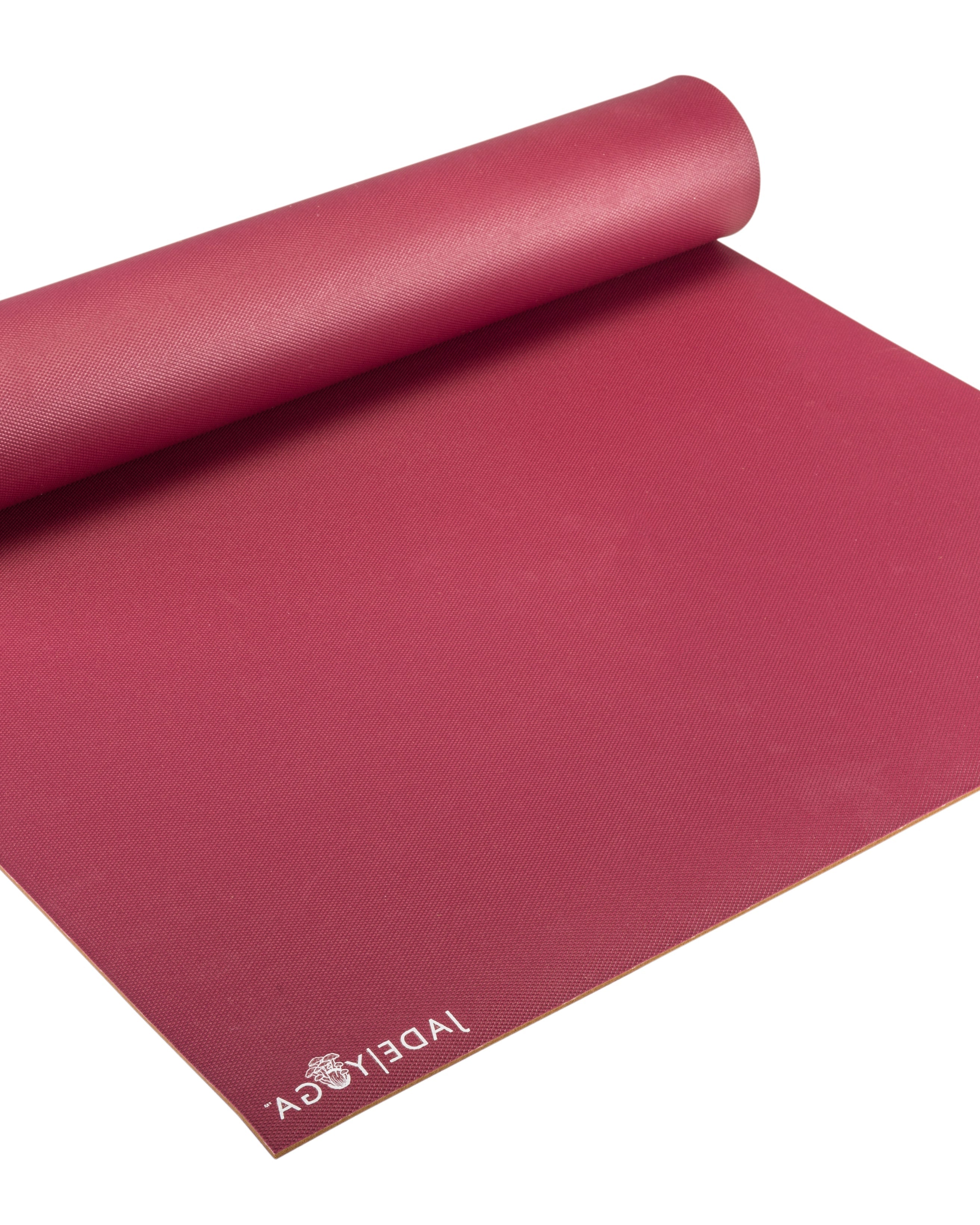Red yoga mat made from mushrooms with 'Jade Yoga' logo on a white background