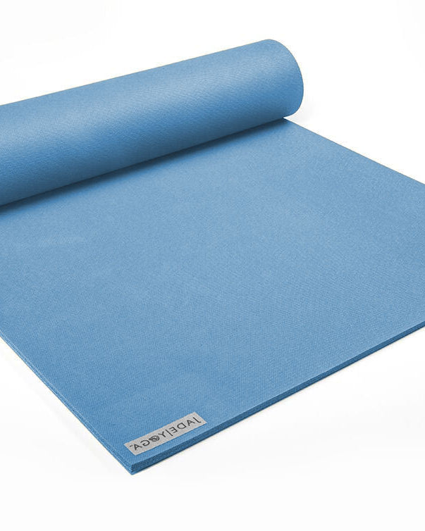 Blue yoga mat with a brand logo on a white background