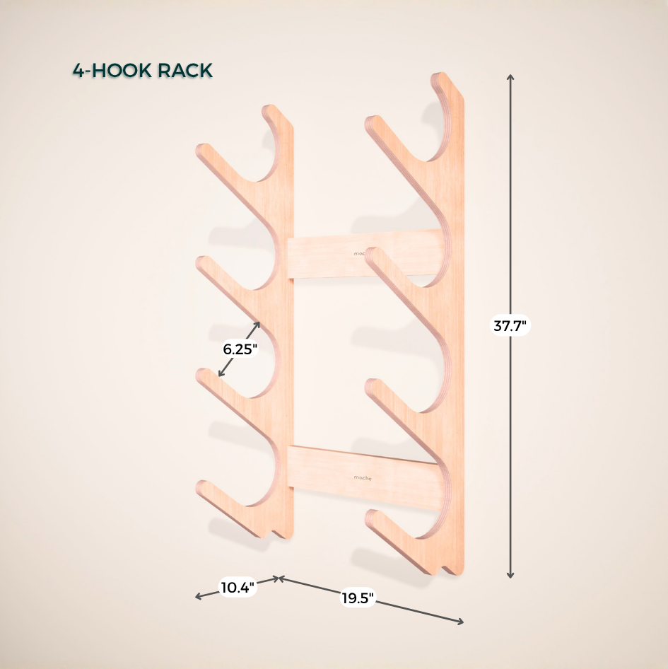 Wooden 4-hook rack with measurements on a beige background