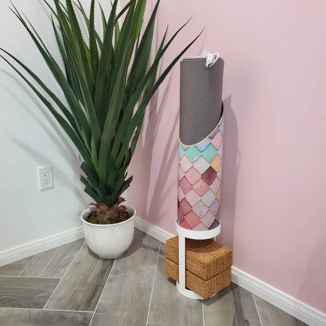 Yoga Mat Holder with Floor Stand in Front of Pink Wall