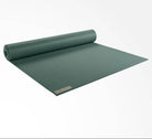 Jade green yoga mat with a brand logo on a white background